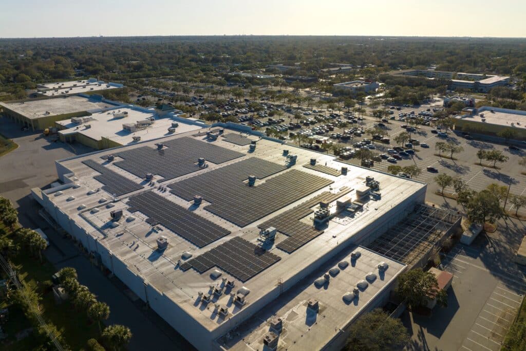 warehouse with solar panels on the roof
