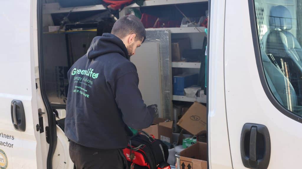 GreenLife auditor getting ready for the energy assessment