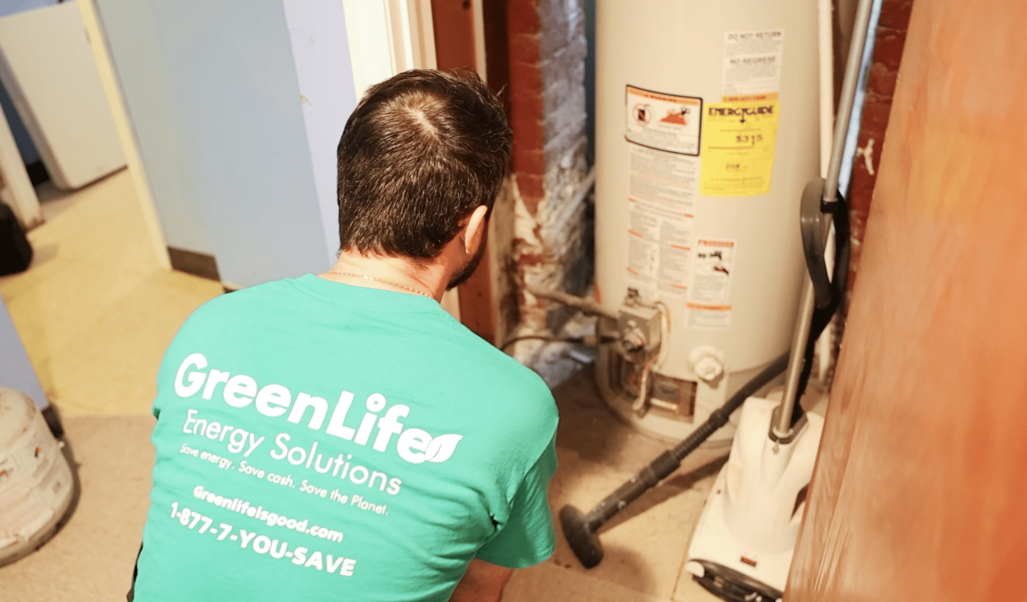 Energy Auditor testing a water heater