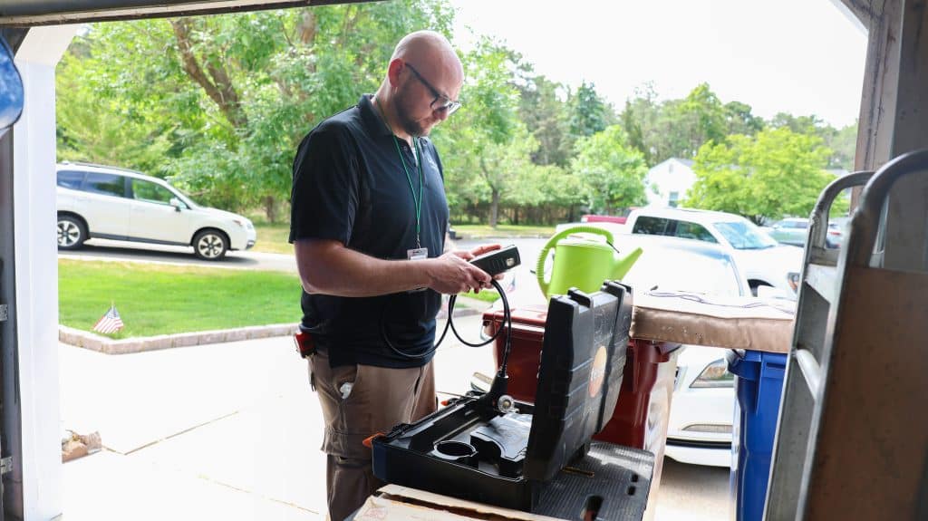 Energy Auditor using a carbon monoxide analyzer .