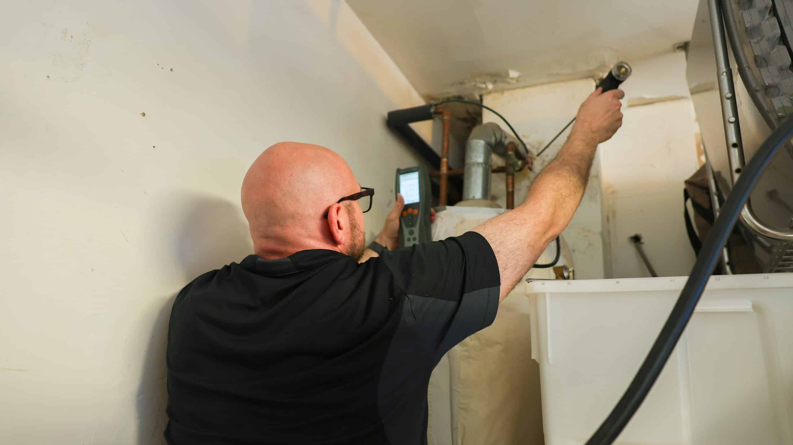 Energy Auditor using a carbon Monoxide Analyzer