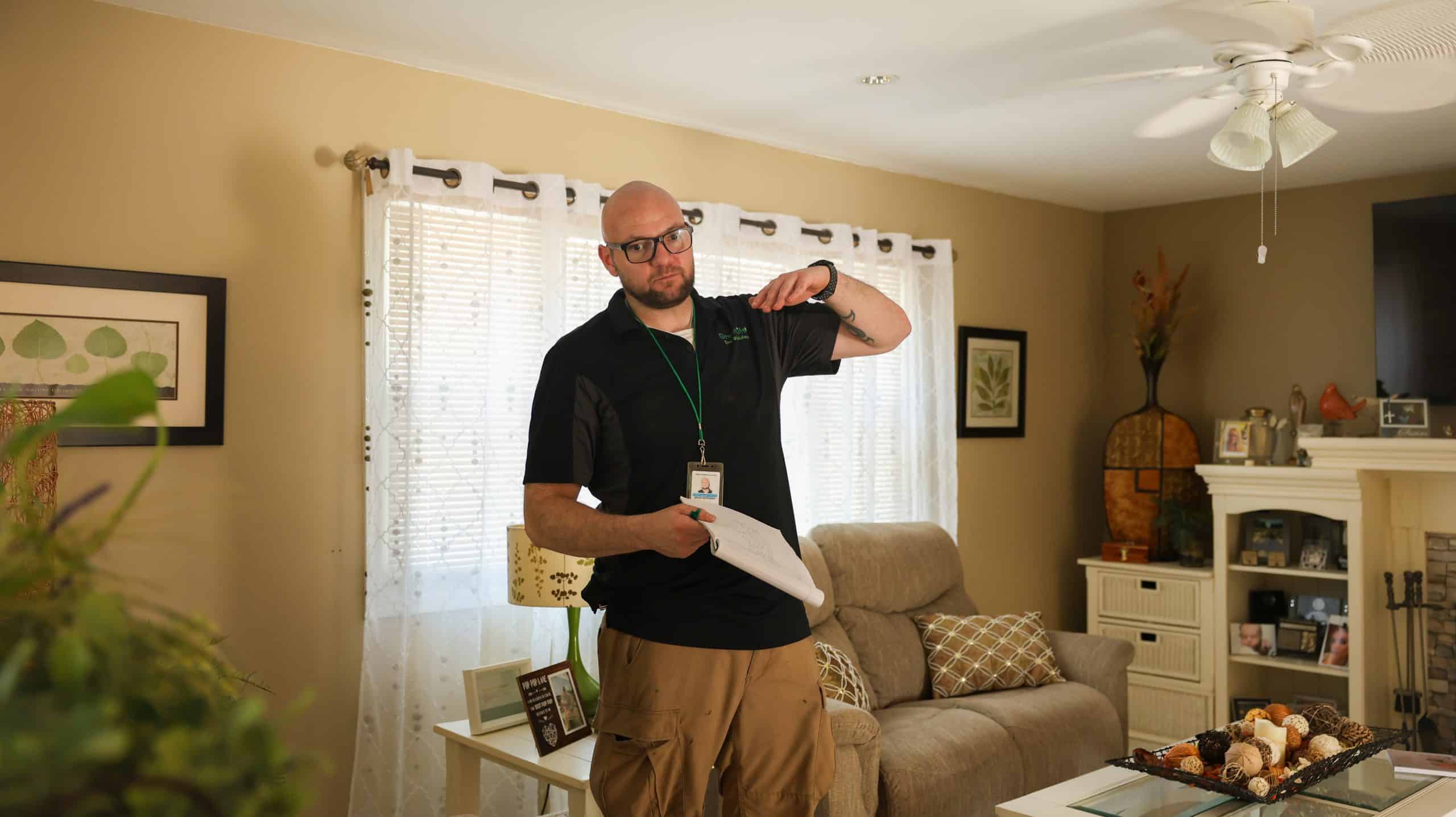 Energy Auditor explaining the results of the energy assessment to the home owner.
